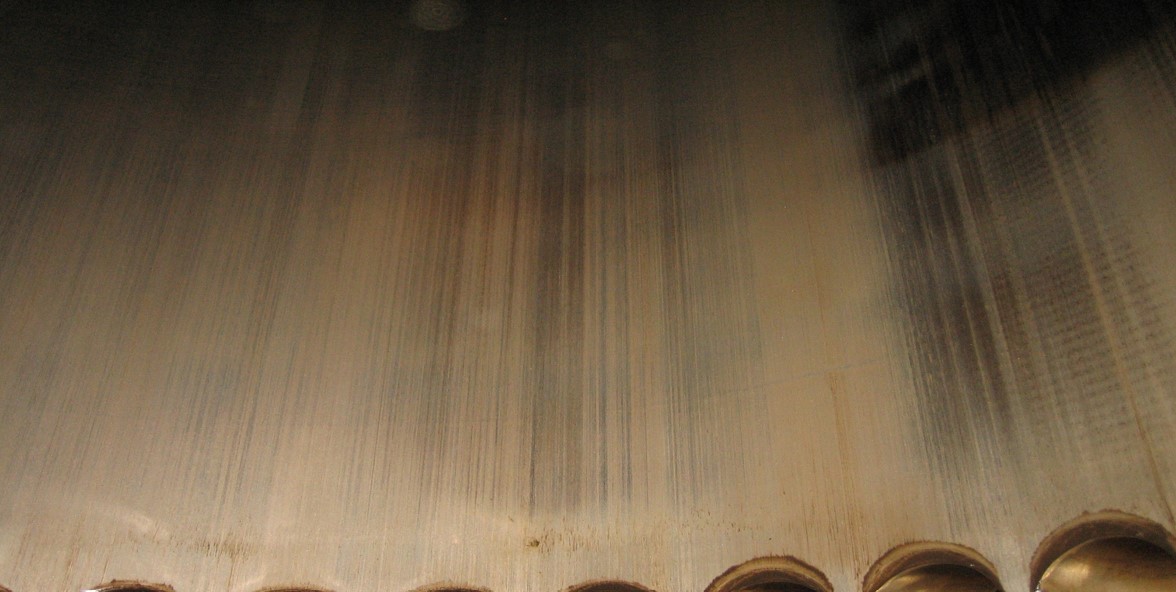 Cylinder wear in two-stroke marine engines